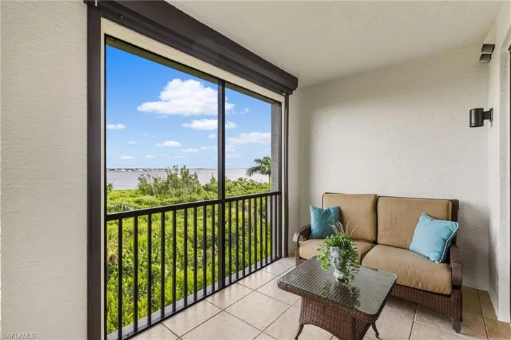 Lovely seating area on your lanai with wonderful views of the river.