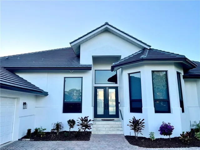 View of front house featuring french doors