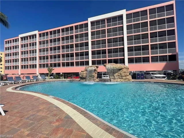 View of pool with pool water feature
