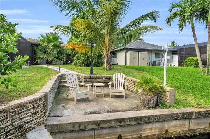 View of patio / terrace featuring a lanai