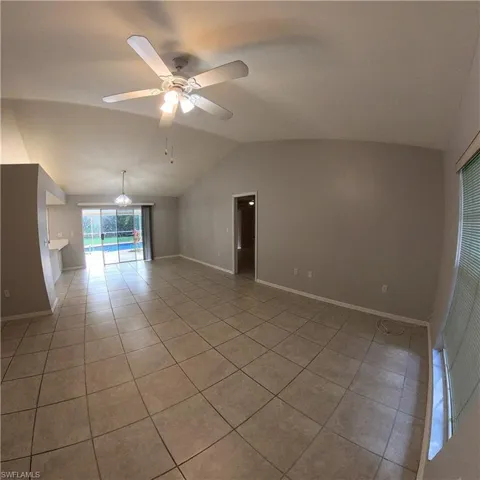 546 Whispering Wind Bend, Lehigh Acres, Florida 33974
