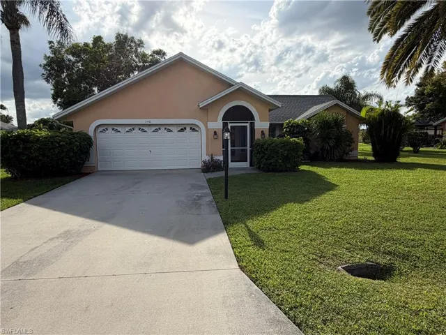 546 Whispering Wind Bend, Lehigh Acres, Florida 33974