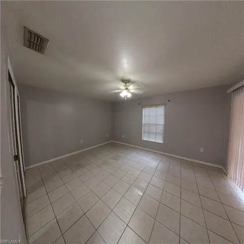 546 Whispering Wind Bend, Lehigh Acres, Florida 33974