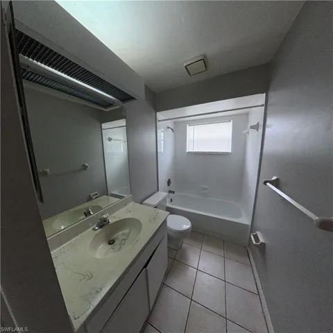 546 Whispering Wind Bend, Lehigh Acres, Florida 33974