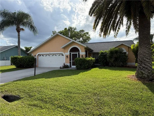 546 Whispering Wind Bend, Lehigh Acres, Florida 33974