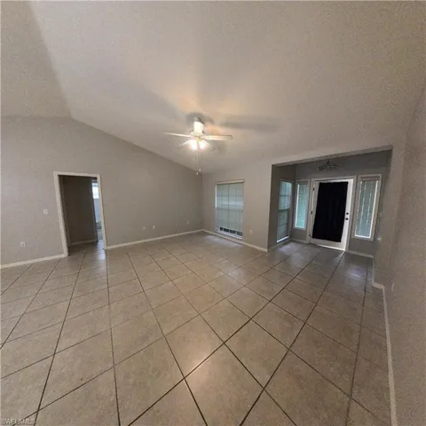 546 Whispering Wind Bend, Lehigh Acres, Florida 33974