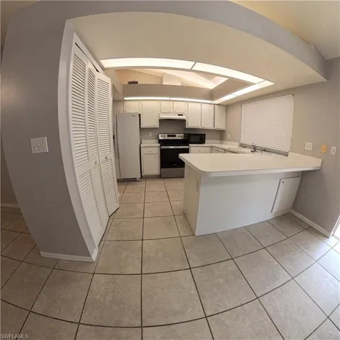546 Whispering Wind Bend, Lehigh Acres, Florida 33974