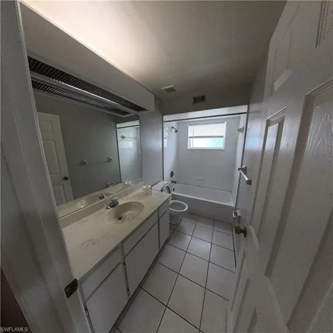 546 Whispering Wind Bend, Lehigh Acres, Florida 33974