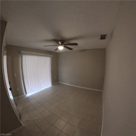 546 Whispering Wind Bend, Lehigh Acres, Florida 33974