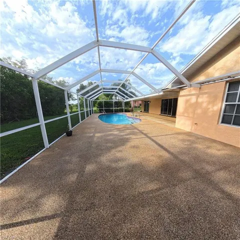 546 Whispering Wind Bend, Lehigh Acres, Florida 33974