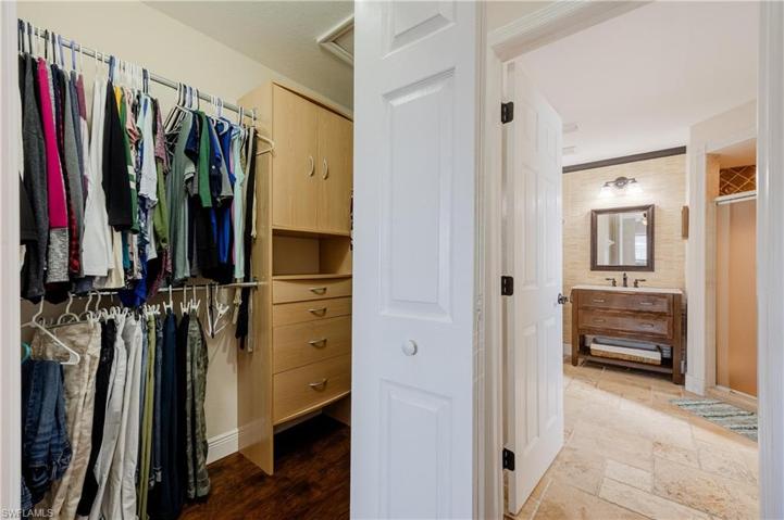 walk-in closet in master bedroom