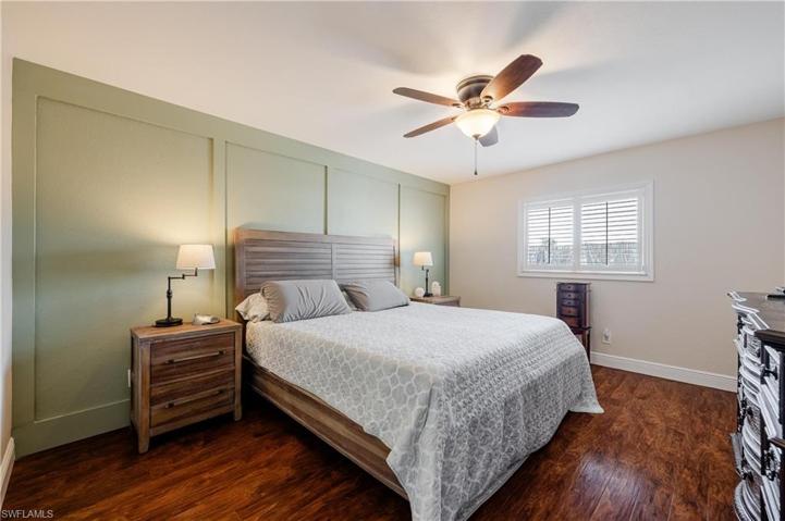 Master Bedroom with new ceiling fan and wood flooring