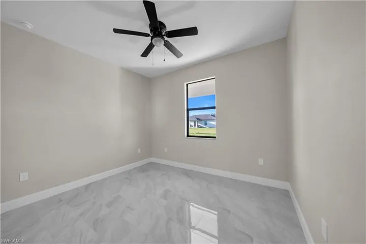 Full bathroom featuring a marble finish shower, double vanity, marble finish flooring, and recessed lighting