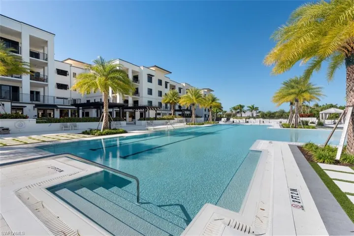 Community pool featuring a patio area