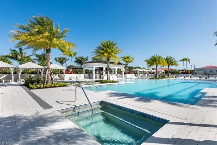 Community pool featuring a gazebo, a patio, and a community hot tub