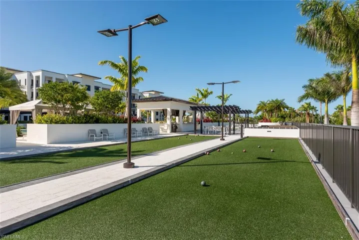 Surrounding community featuring a game area and a patio area