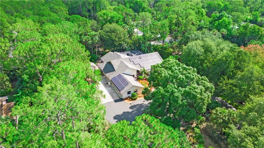 View of property location with a forest