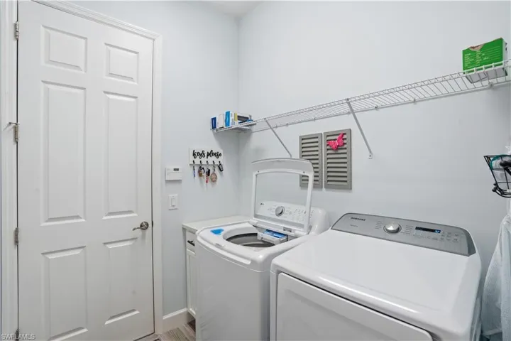 Laundry room with garage access.