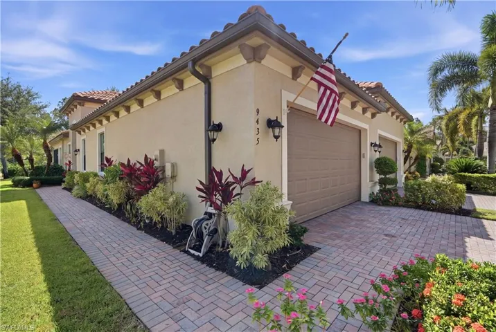 Beautifully landscaped and maintained, just steps from the community pool.
