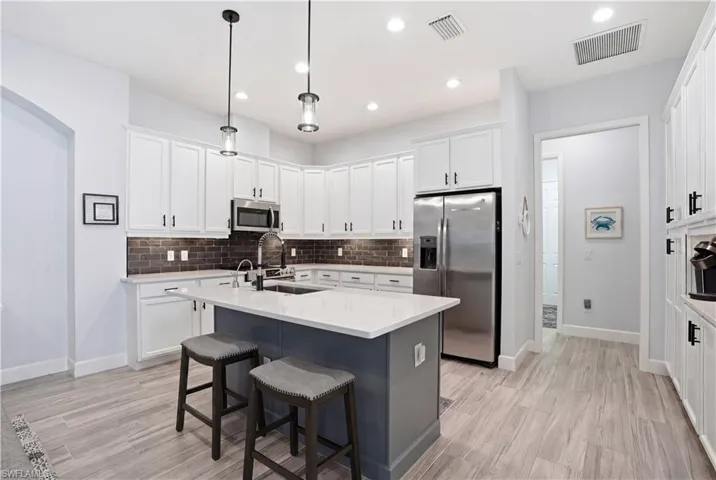 Chef-inspired kitchen with oversized island.
