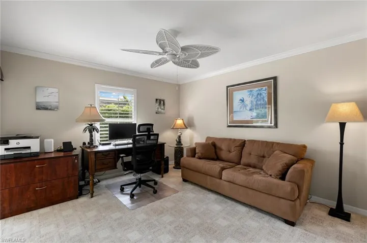 Third bedroom/office space featuring ceiling fan and crown molding
