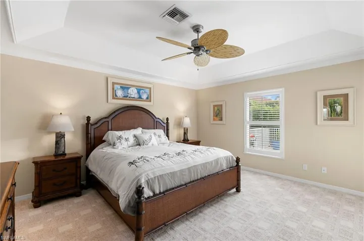 Master Bedroom featuring ceiling fan, and light carpet