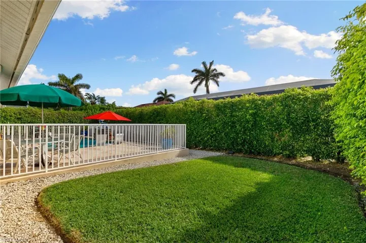 View of yard with a patio area and a fenced in pool