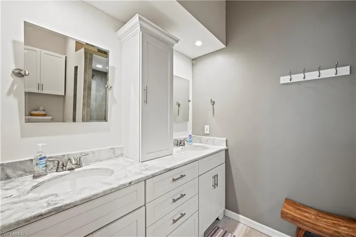 Bathroom featuring double vanity