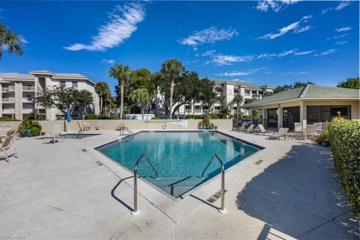 Community pool featuring a patio area
