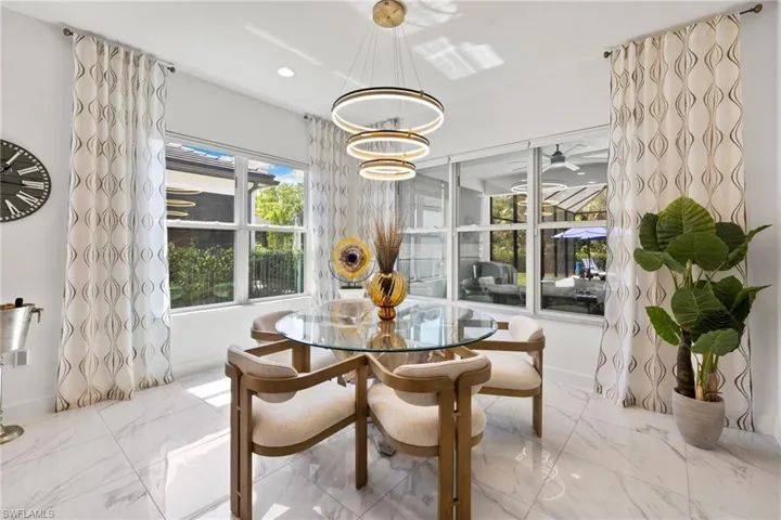 Dining space featuring baseboards and recessed lighting
