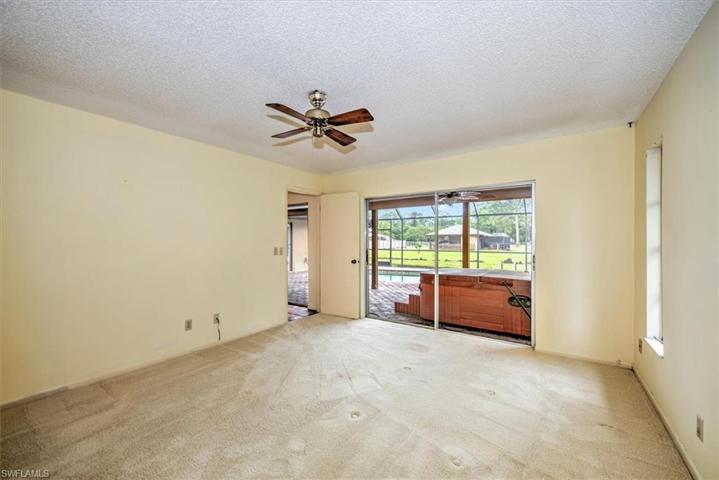 Master Bedroom looking out to patio/pool