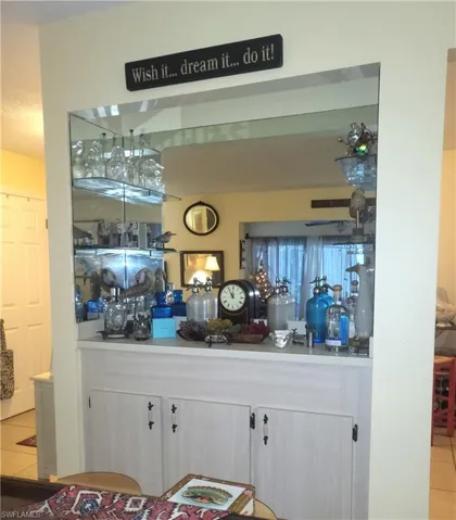 Bar with glass shelves perfect for entertaining