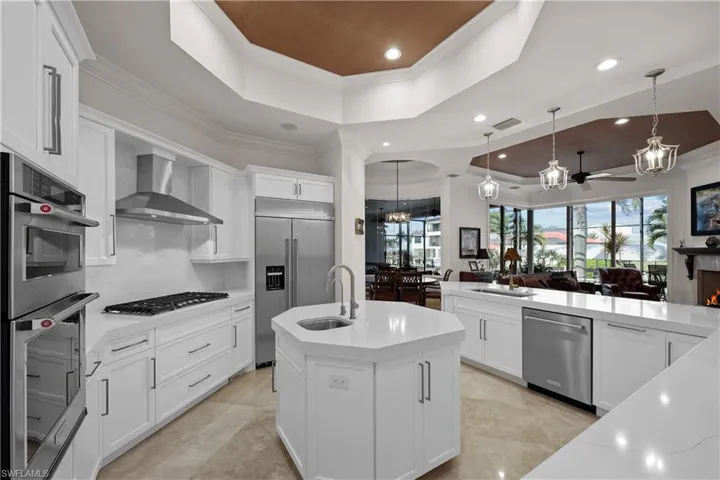 Like new updated kitchen, gas cooktop, KitchenAid Stainless appliances, Pompeii Quartz countertops and custom cabinets
