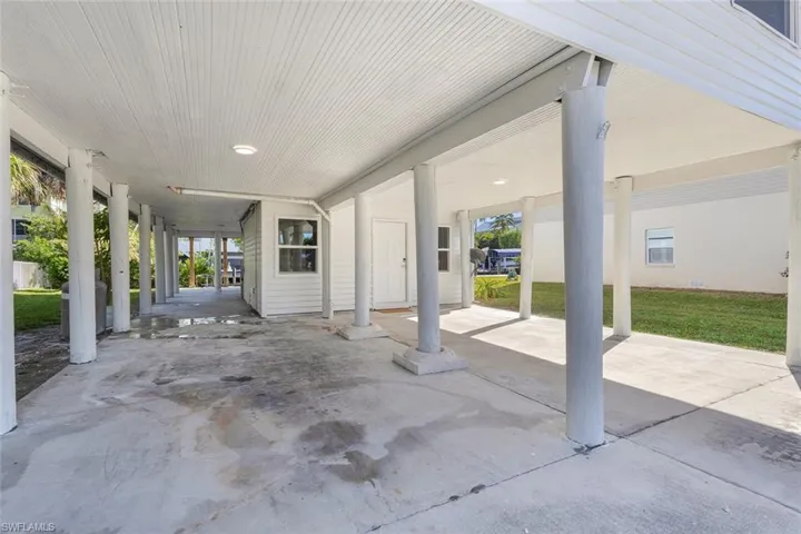 View of patio featuring an attached carport