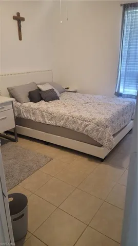 View of tiled bedroom