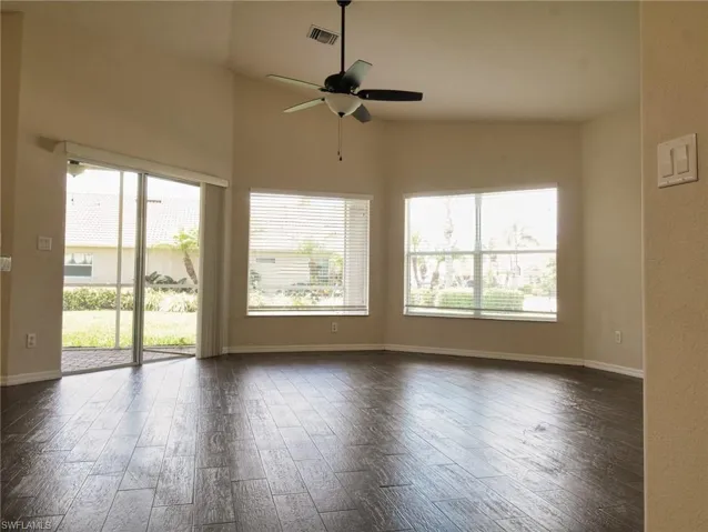 Vaulted ceilings with a ceiling fan overhead