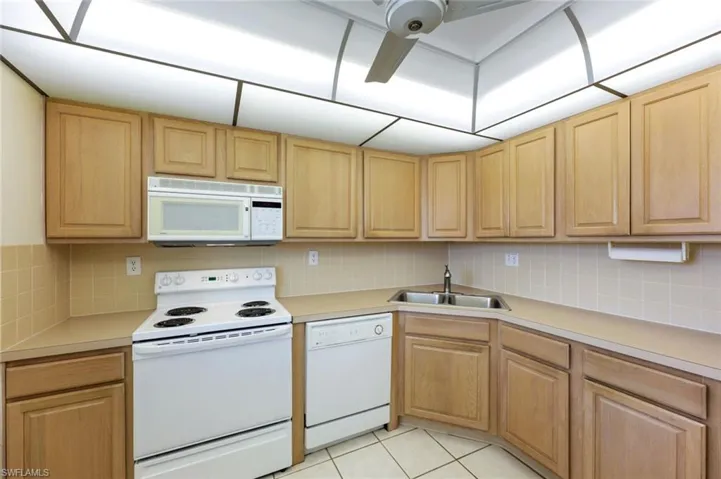 Kitchen with white appliances