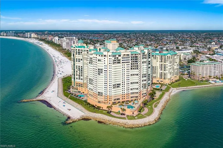 View of urban area with expansive beach
