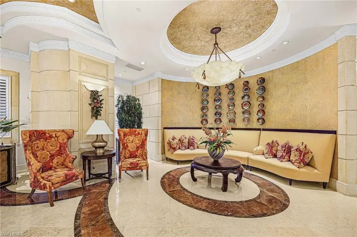 Building lobby with ornamental molding and recessed lighting