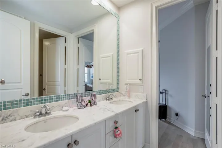 Bathroom featuring vanity and hardwood / wood-style flooring