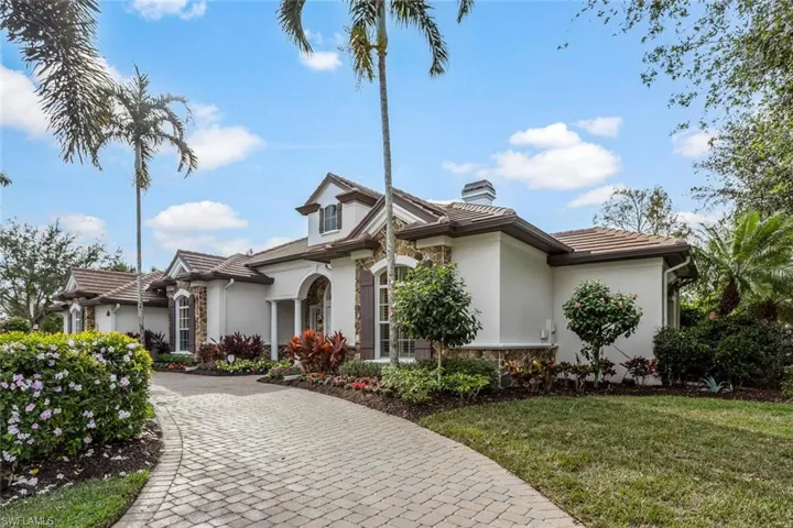 View of front of property with a front yard