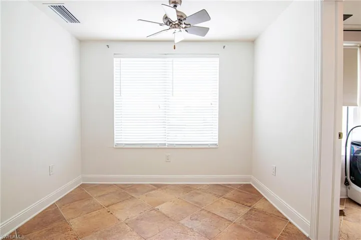 OFFICE/DEN leads to IN-UNIT LAUNDRY ROOM w/ MAYTAG FRONT LOAD WASHER & DRYER