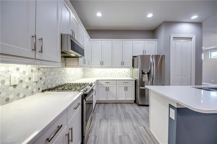 kitchen with natural gas and island