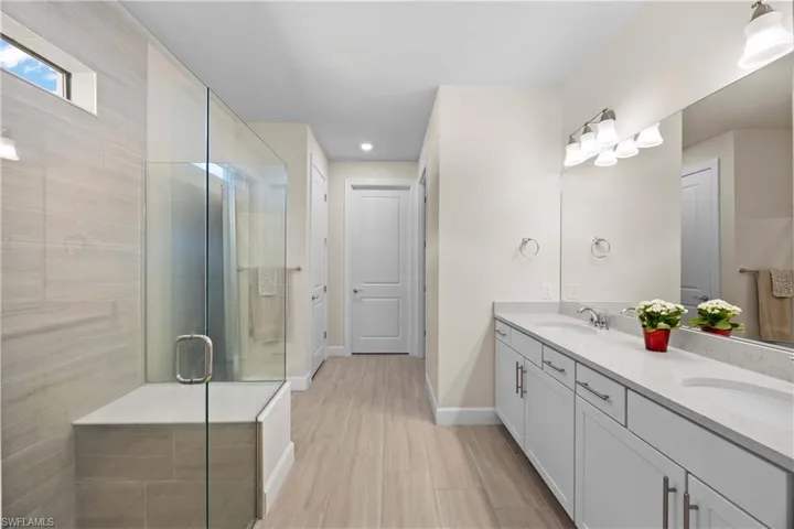 Owner's Bathroom w/ Expansive Shower & Walk-In Closet