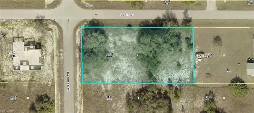 Aerial map of property and surrounding area with property parcel outlined