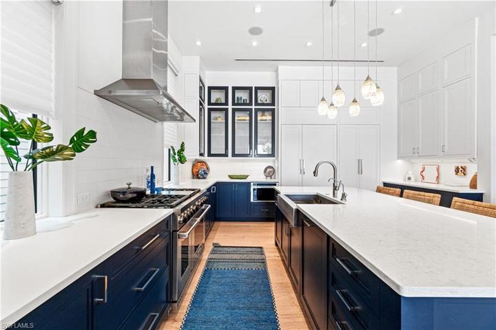 Large island, top of the line appliances, walk in panty, fabulous kitchen