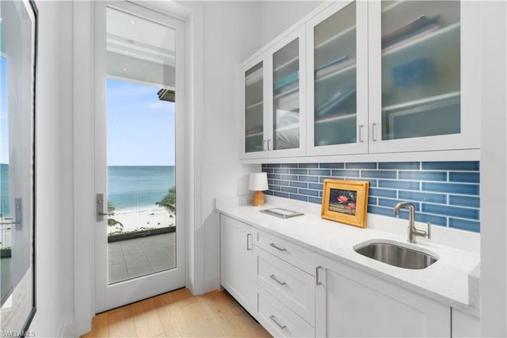 Upstairs wet bar with access to another balcony