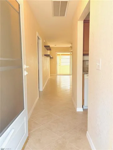 Entry Hall featuring light tile patterned floors