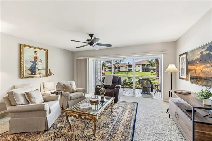 Living room opens to screened lanai