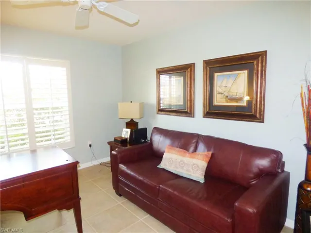 Den w/Tile Flooring Plantation Shutters